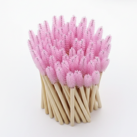 Cepillo de cejas con mango en bambú (Bamboo) Rosa desechables por 10 unidades